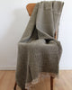 Neutral Turkish cotton throw with waffle weave and tonal fringe detailing